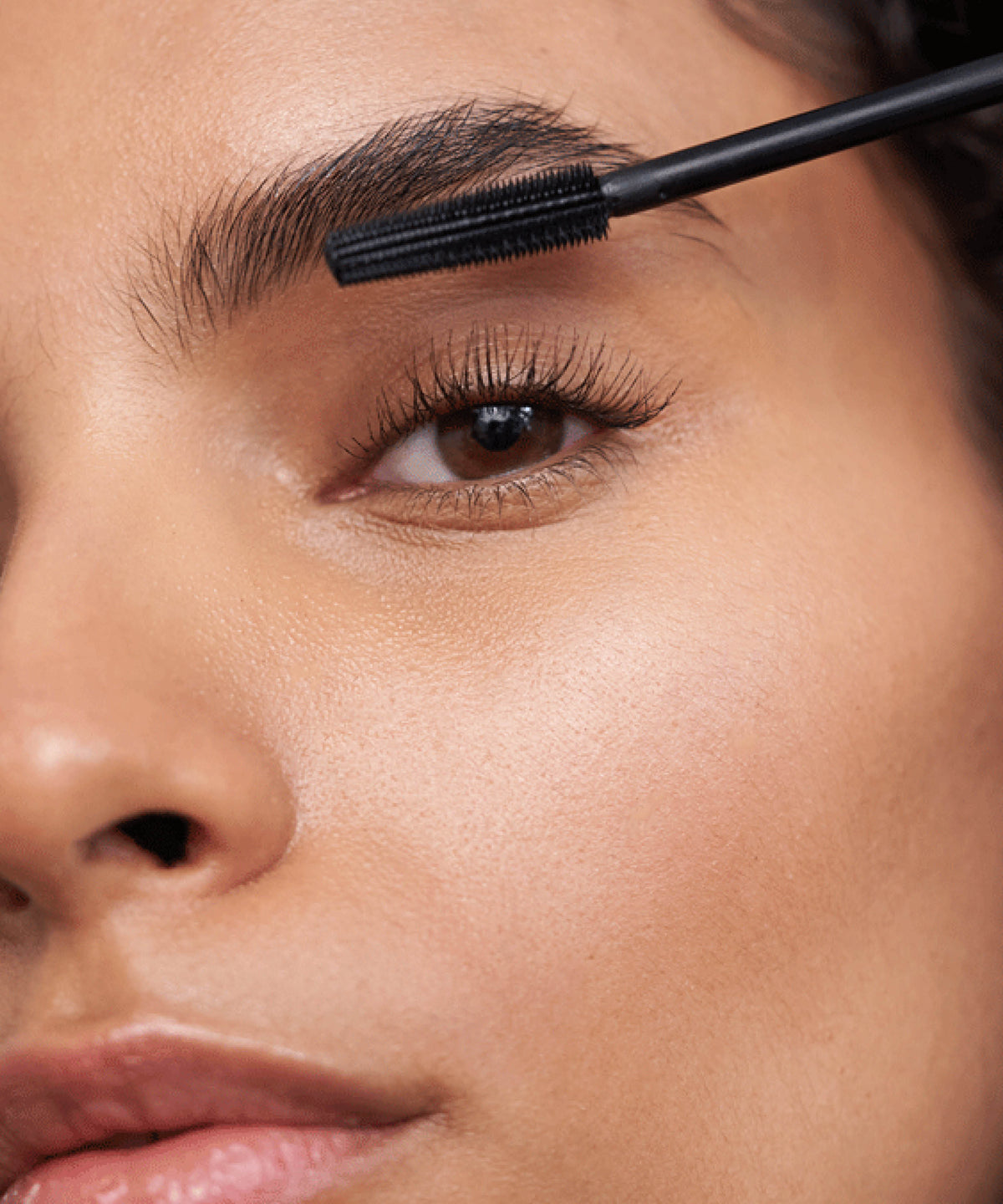 mascara; Black: Dania wears the Lengthening Day Mascara in Black