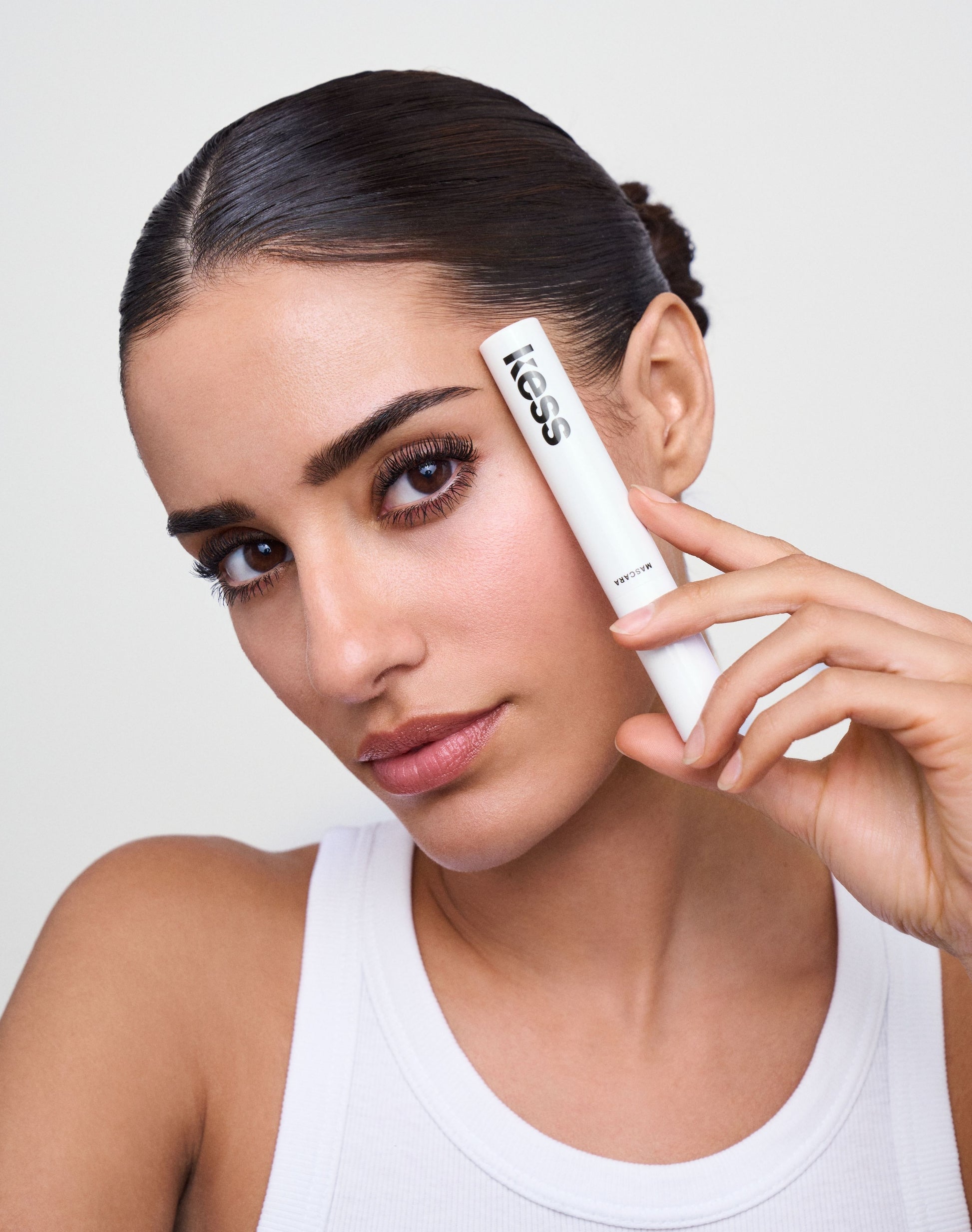 night-mascara; midnight-black: Naomi wears the Volumising Night Mascara in Midnight Black