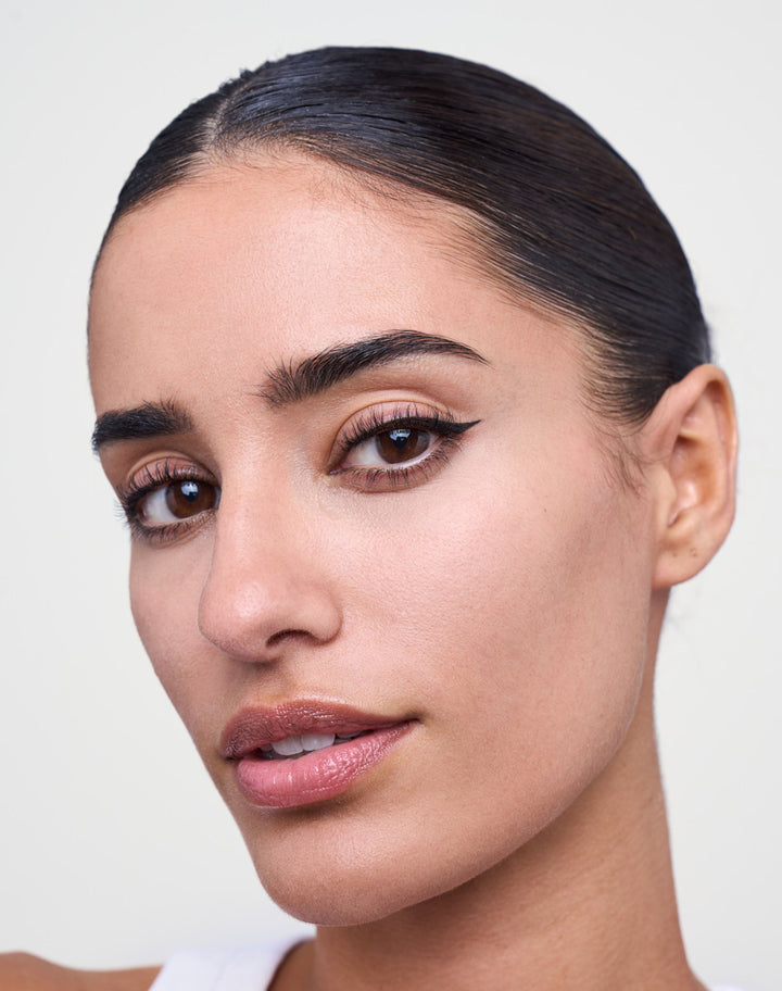 liquid-eyeliner; deep black: Naomi wears the Liquid Eyeliner in Deep Black