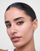 liquid-eyeliner; deep black: Naomi wears the Liquid Eyeliner in Deep Black