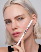 ; Julia wears Soft Shape Lip Liner in Natural Rose