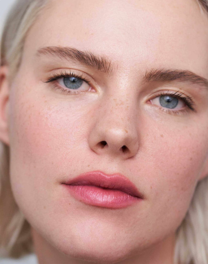 soft-shape-lip-liner; natural rose: Julia wears the Soft Shape Lip Liner in Natural Rose + Lipstick in Rosy Pink