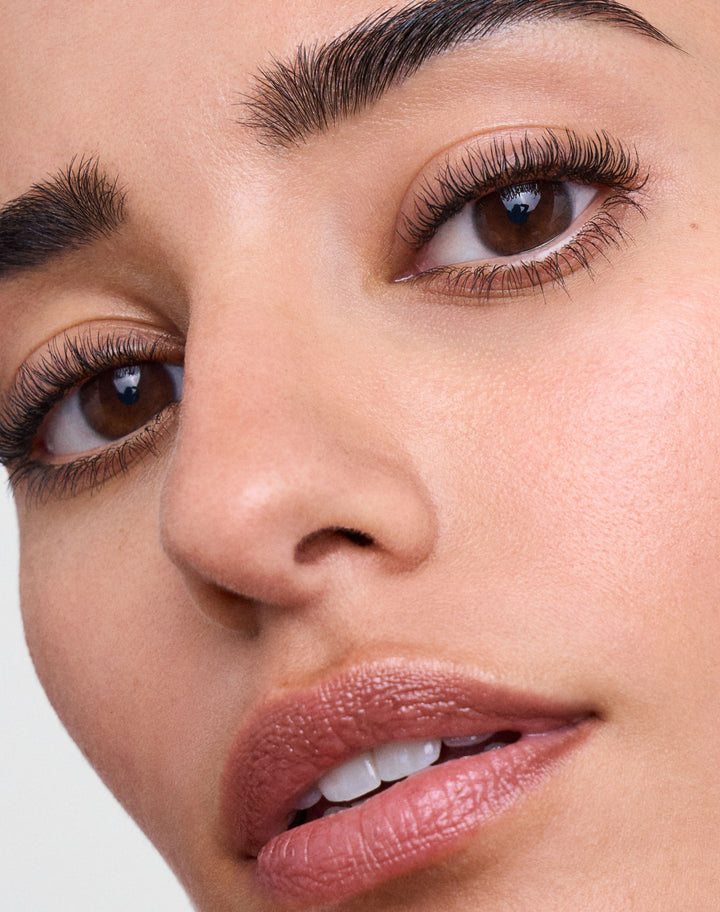 mascara; Black: Naomi wears the Lengthening Day Mascara in Black