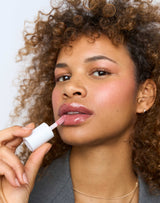 chronically late; Step 3: Samira wears the Jelly Treat Lip Oil in Jam