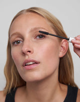 black; Johanna wears the DAY Mascara in Black