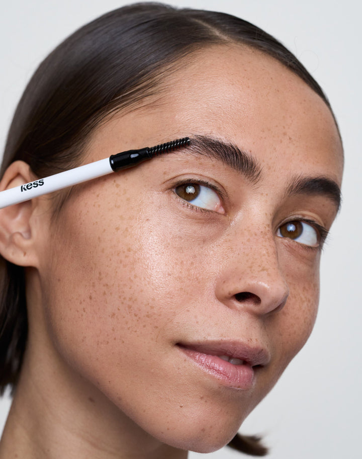 easy-brow-pencil; dark-brown: Natalia wears the Easy Brow Pencil in Dark Brown