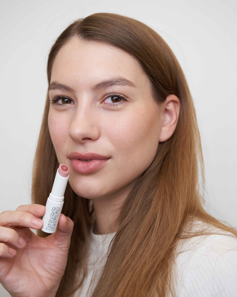 ; Johanna wears the Lip Balm in Nudie