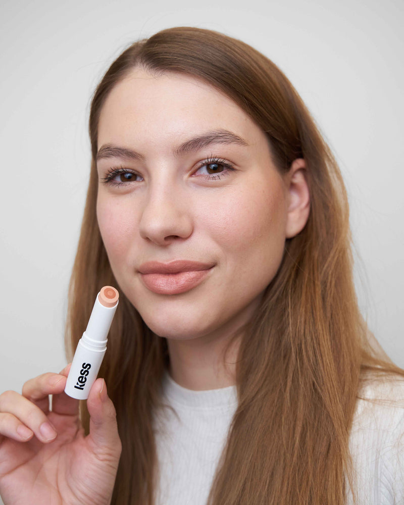 ; Johanna wears the Lip Balm in Nudie