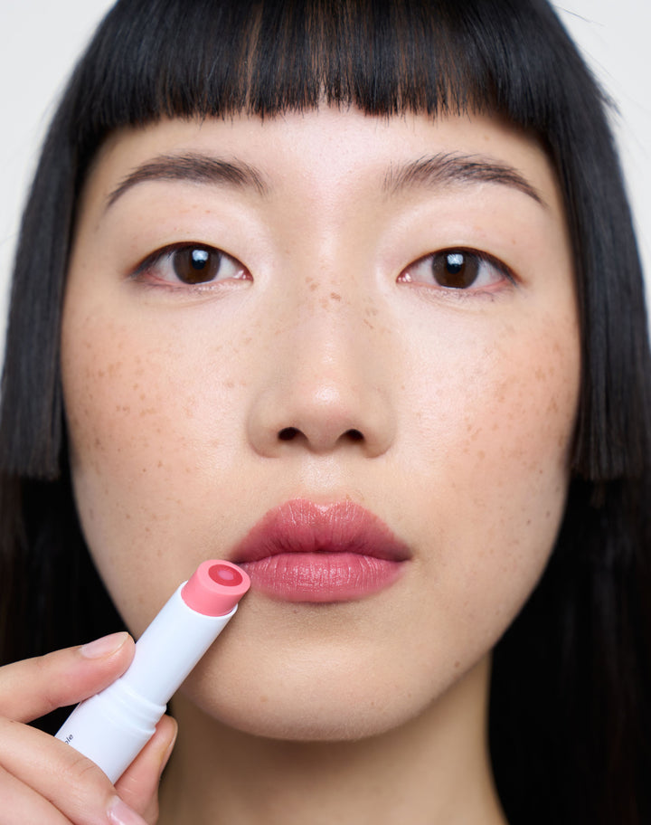 triple-tint-lip-balm; Kiss: Loo Loo wears the Triple Tint Lip Balm in Kiss