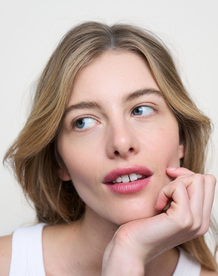 triple-tint-lip-balm; Kiss: Lydia wears the Triple Tint Lip Balm in Kiss