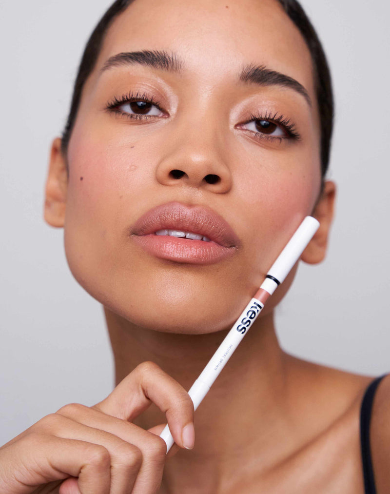 neutral-brown; Celine wears the Soft shape Lip Liner in Neutral Brown