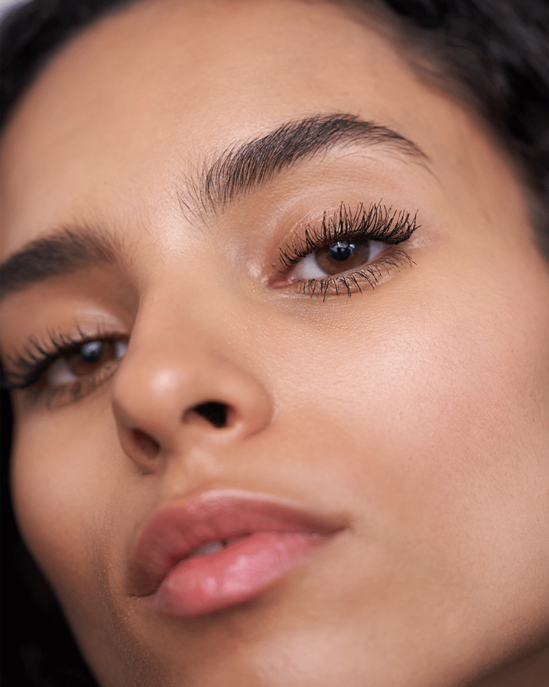 midnight-black; Dania wears the NIGHT Mascara for extra volume