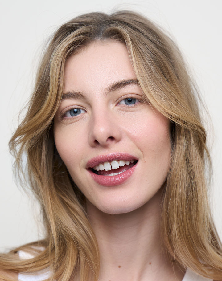 triple-tint-lip-balm; Nudie: Lydia wears the Triple Tint Lip Balm in Nudie