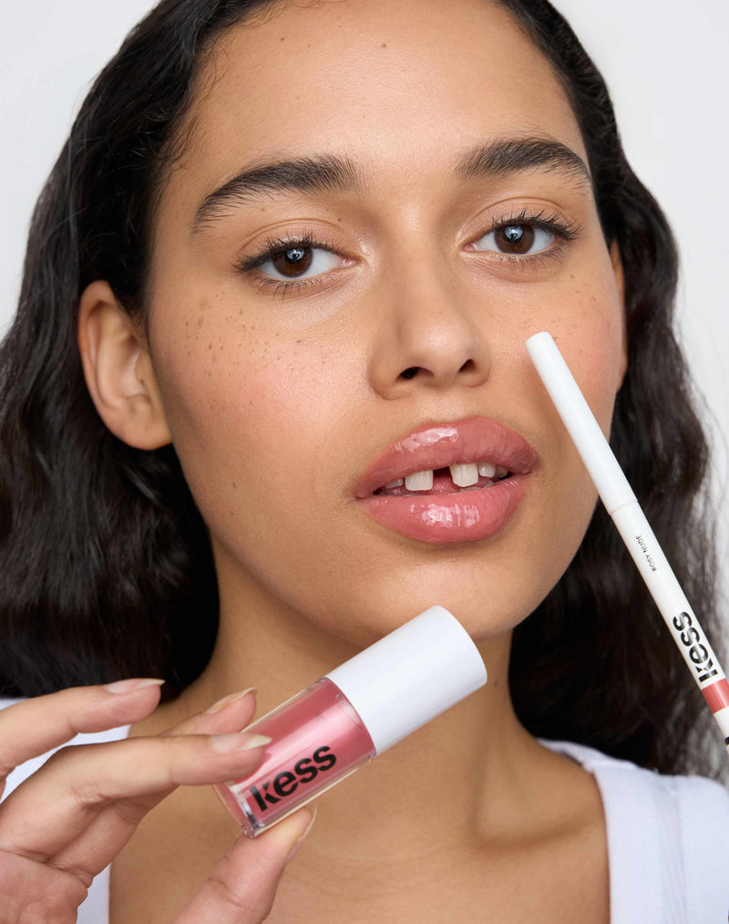 rosy nude; Louisa wears the Lip Liner in Rosy Nude and Jelly Treat Lip Oil in Slip