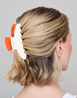 ; Jennifer wears the Limited Edition Duo Claw Clip
