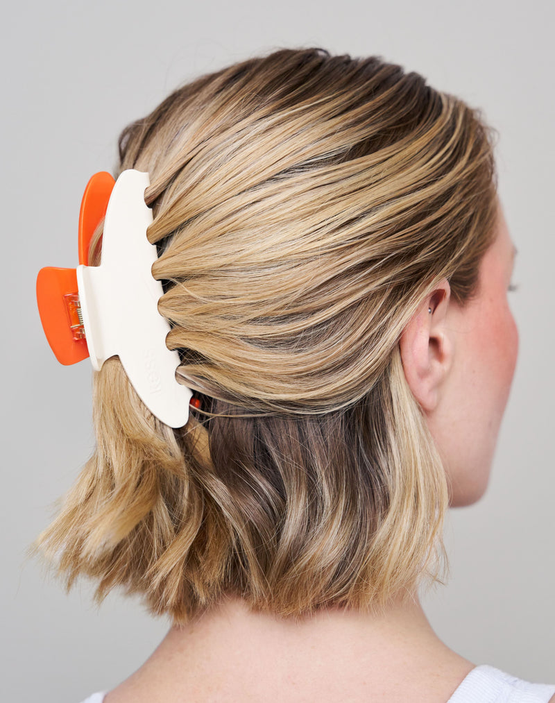 ; Jennifer wears the Limited Edition Duo Claw Clip