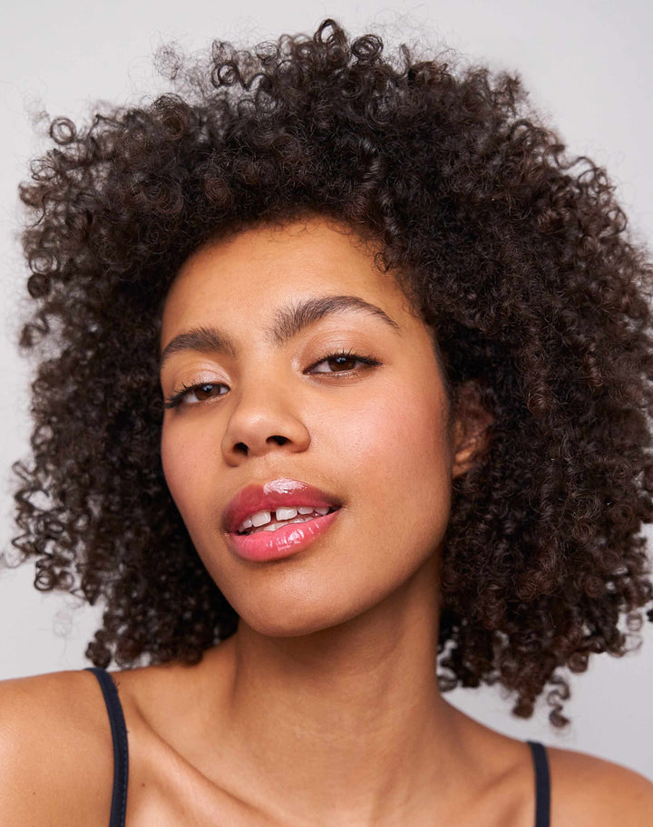jelly-treat-lip-oil; drip: Theresa wears the Jelly Treat Lip Oil in Drip