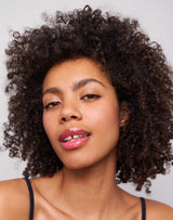 jelly-treat-lip-oil; drip: Theresa wears the Jelly Treat Lip Oil in Drip