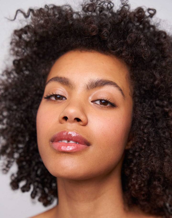 jelly-treat-lip-oil; jam: Theresa wears the Jelly Treat Lip Oil in Jam