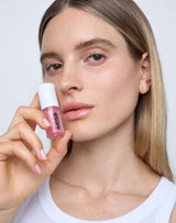 jelly-treat-lip-oil; slip: Inga wears the Jelly Treat Lip Oil in Slip