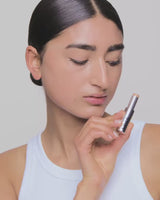 medium-2; Aya inserts the refill into the case until it clicks into place - she wears shade Medium 2