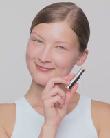 light-to-medium; Pupa inserts the refill into the case until it clicks into place - she wears shade Light to Medium