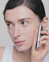 fair-to-light; Ana inserts the refill into the case until it clicks into place - she wears shade Fair to Light