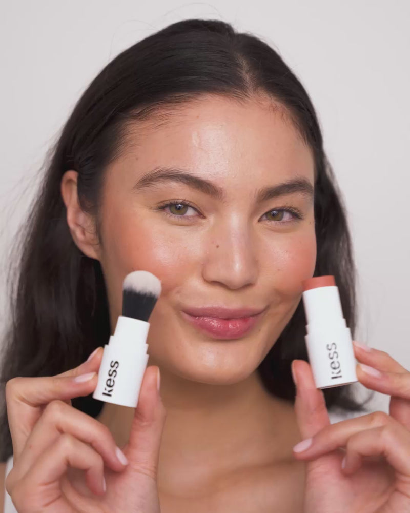 ; Sarah blends the Cheeks blush with the Click-In Brush both clicked into the Mono Stick Case