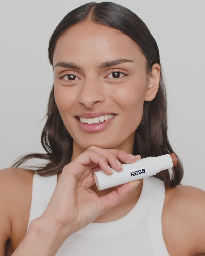 duo-stick; tan-bronzer: Melanie wears the Cream Bronzer in Tan