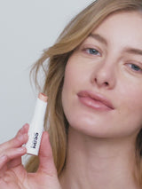 Nothin; Lydia wears the Triple Tint Lip Balm in Nothin