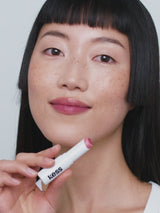 Kiss; Loo Loo wears the Triple Tint Lip Balm in Kiss